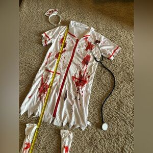 Killer caregiver nurse costume size L 12-14